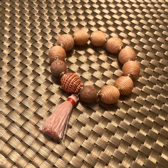 Beautiful beaded peach neutral bracelet with tassel - Picture 1 of 4